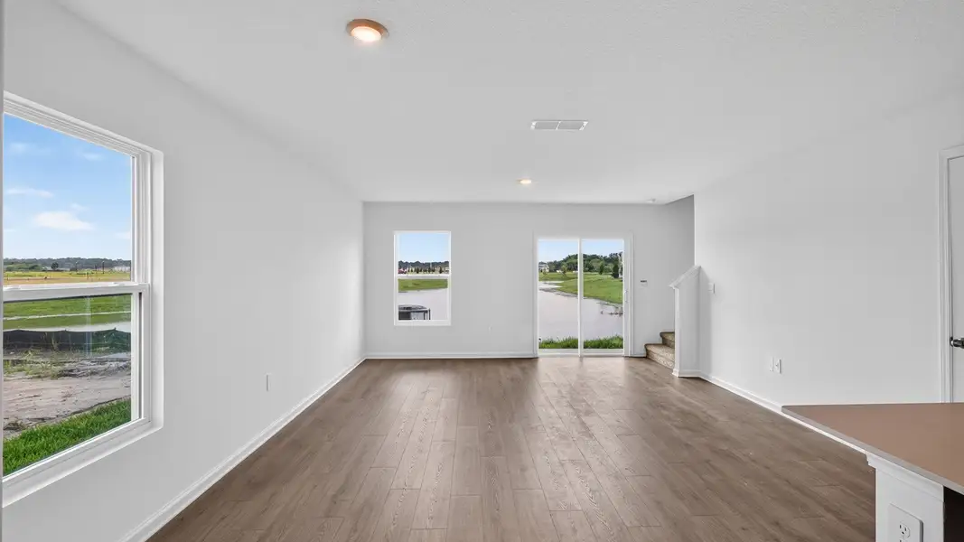 Representative unfurnished interior of a home built from the Weston by D.R. Horton in Bridle Creek Townhomes, Jacksonville (Image 12).