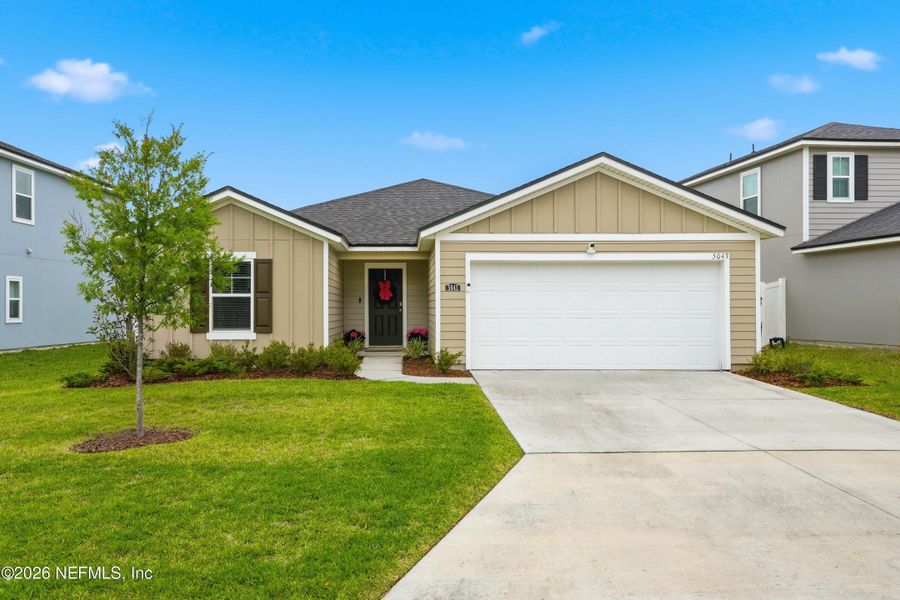 Front exterior of a new home in , Jacksonville, FL, highlighting curb appeal (Image 20).