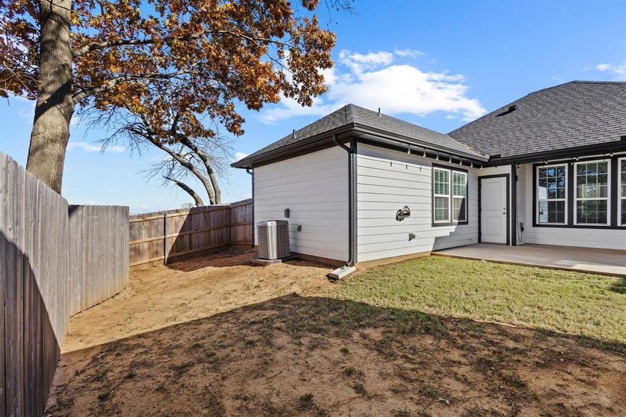 Exterior details and patio area of a home in , Denison (Image 24). Exterior details and patio area of a home in , Denison (Image 24).