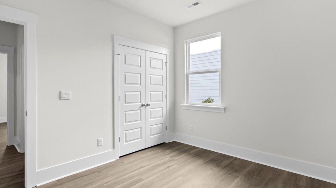 Spacious, unfurnished interior of a new home in Indigo Preserve, Leland (Image 32).