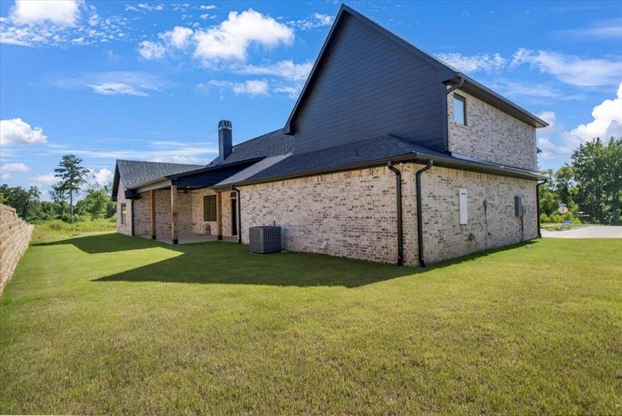 Exterior details and patio area of a home in , Lindale (Image 3). Exterior details and patio area of a home in , Lindale (Image 3).