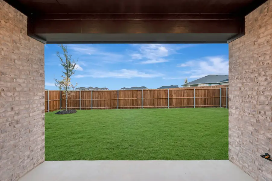Exterior details and patio area of a home in LaPrelle, Fort Worth (Image 20).