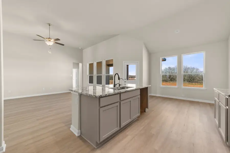 Furnished interior view inside a new home in Villas Las Flores, Floresville (Image 11).