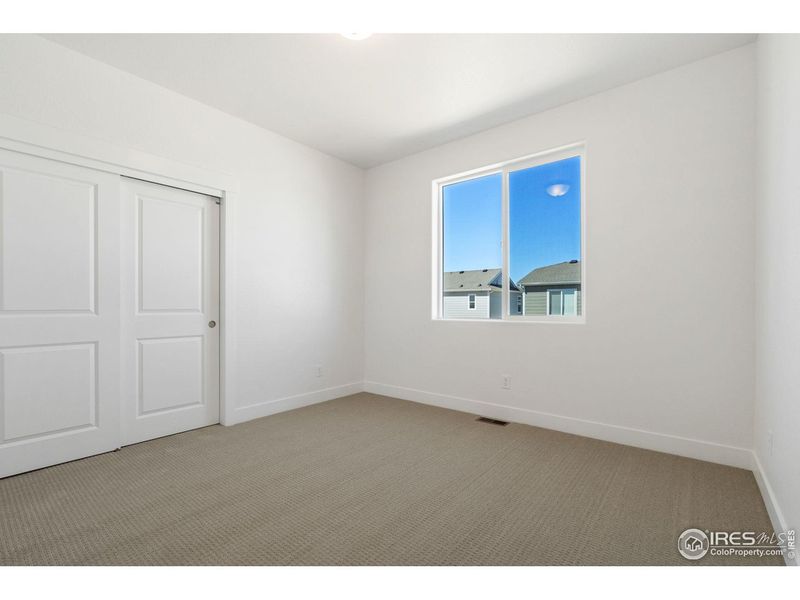 Spacious, unfurnished interior of a new home in Prairie Song, Windsor (Image 34).