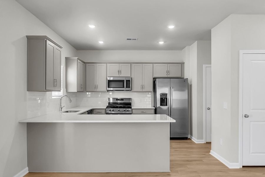 Furnished interior view inside a new home in Six Oaks, Summerville (Image 7).