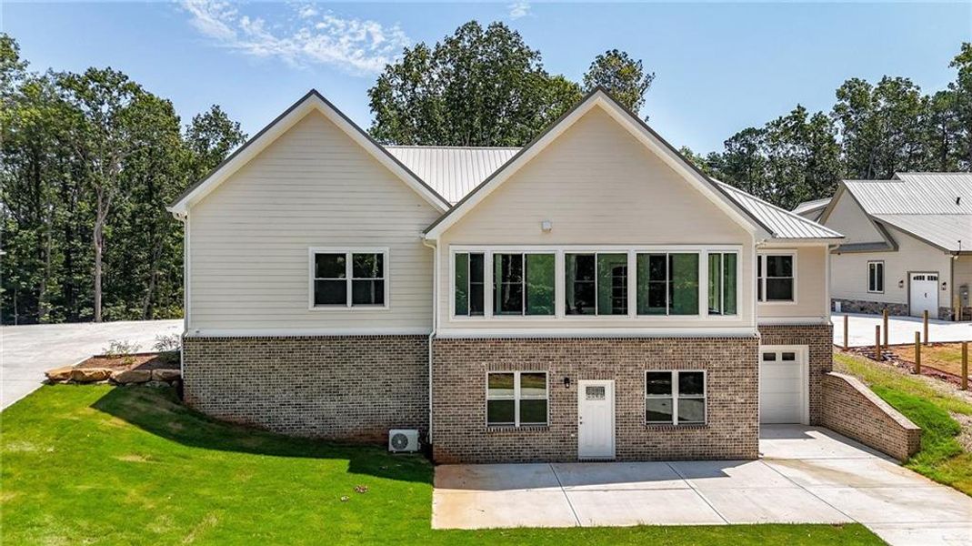 Front exterior of a new home in , Canton, GA, highlighting curb appeal (Image 34).