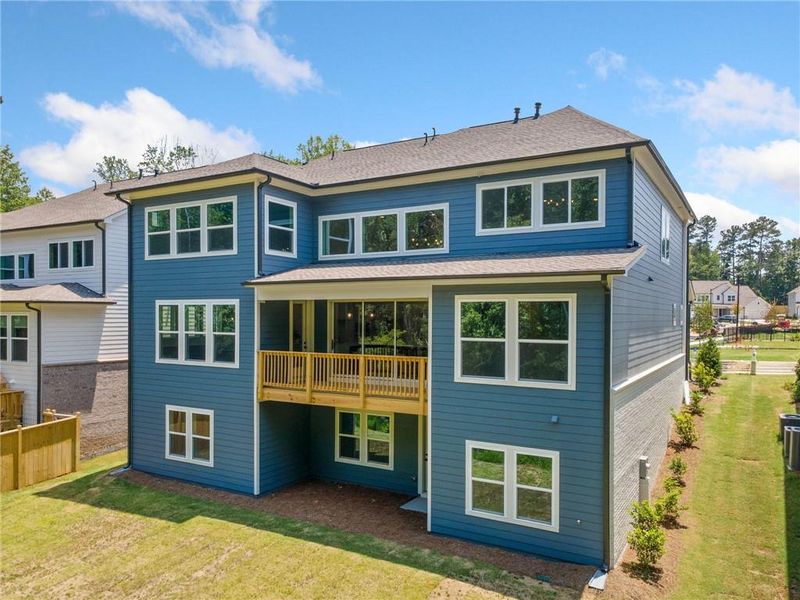 Front exterior of a new home in , Woodstock, GA, highlighting curb appeal (Image 2). Front exterior of a new home in , Woodstock, GA, highlighting curb appeal (Image 2).