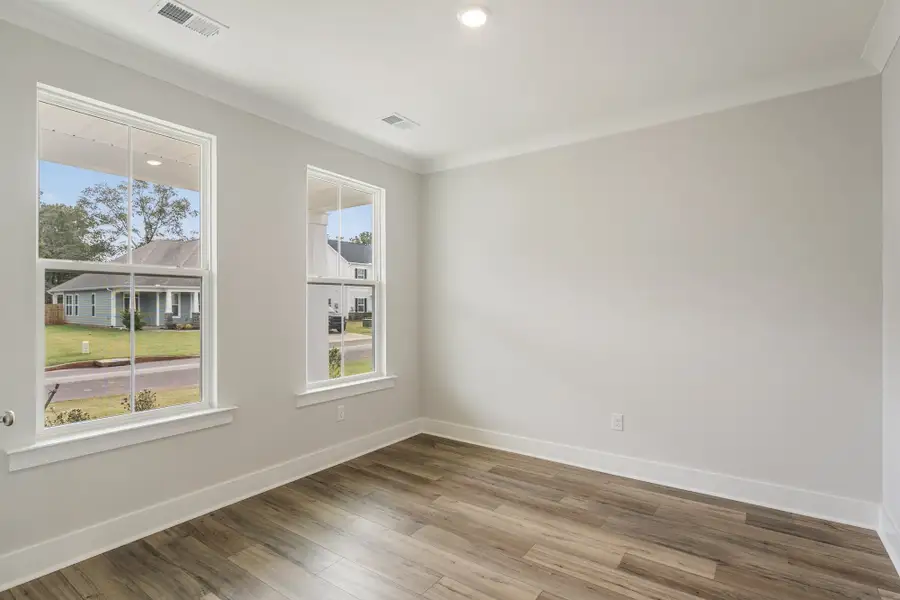 Spacious, unfurnished interior of a new home in Cottages at Lake Emory, Inman (Image 12). Spacious, unfurnished interior of a new home in Cottages at Lake Emory, Inman (Image 12).