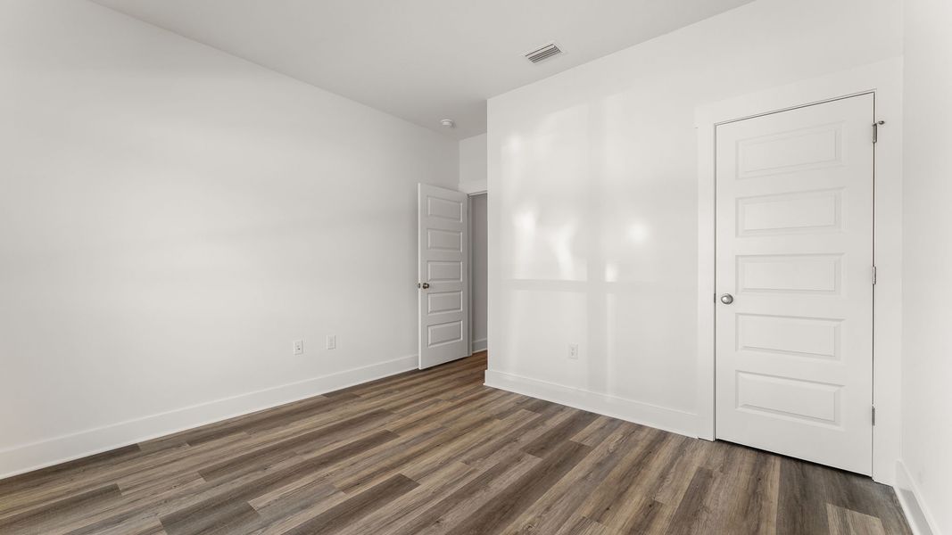 Representative unfurnished interior of a home built from the Kennedy by D.R. Horton in Holley Grove at Peach Creek, Santa Rosa Beach (Image 28). Representative unfurnished interior of a home built from the Kennedy by D.R. Horton in Holley Grove at Peach Creek, Santa Rosa Beach (Image 28).