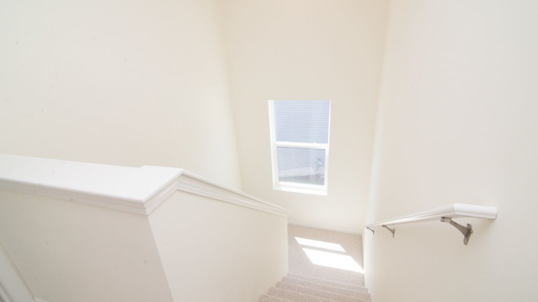 Representative unfurnished interior of a home built from the The Briarhaven III Side Entry by Norfolk Homes in Fosdick Glen of Saline, Saline (Image 61).