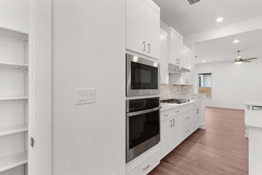 Furnished interior view inside a new home in Lariat, Liberty Hill (Image 9). Furnished interior view inside a new home in Lariat, Liberty Hill (Image 9).