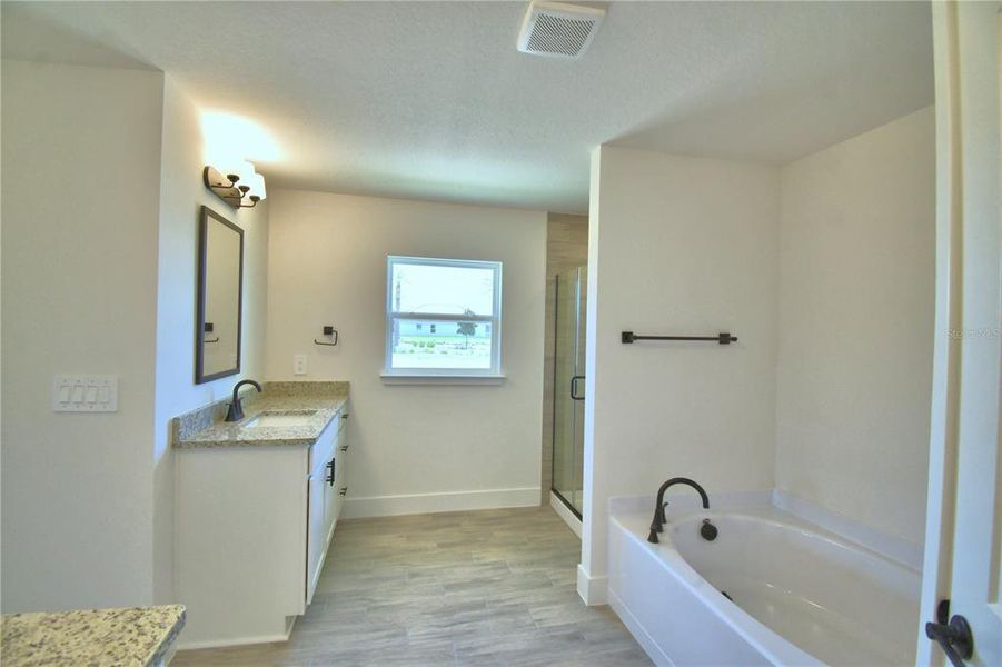 Furnished interior view inside a new home in Lake Juliana Estates, Auburndale (Image 17).