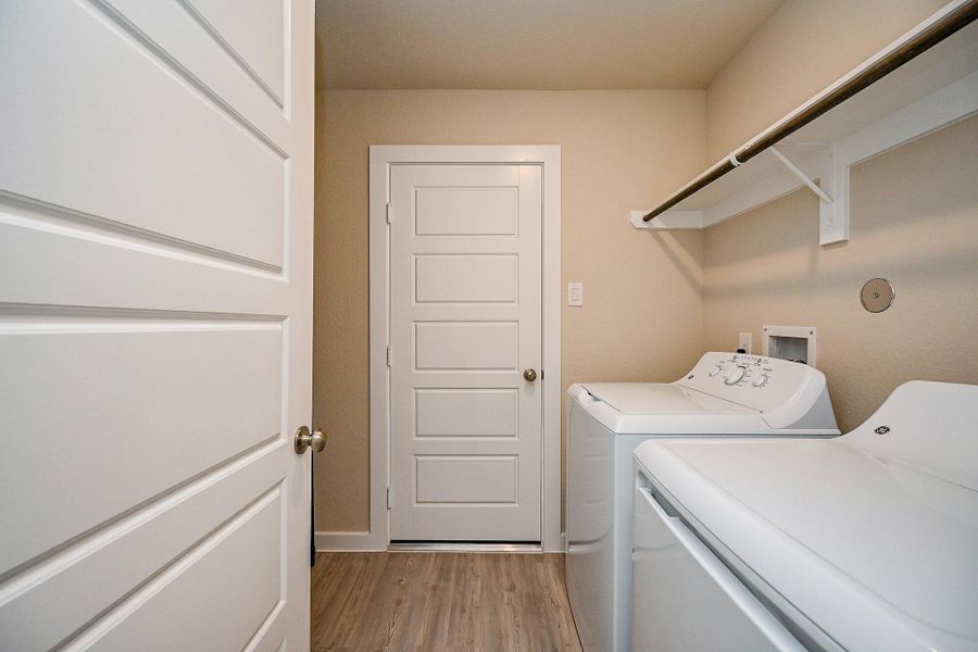 Furnished interior view inside a new home in Mustang Crossing, Alvin (Image 18).