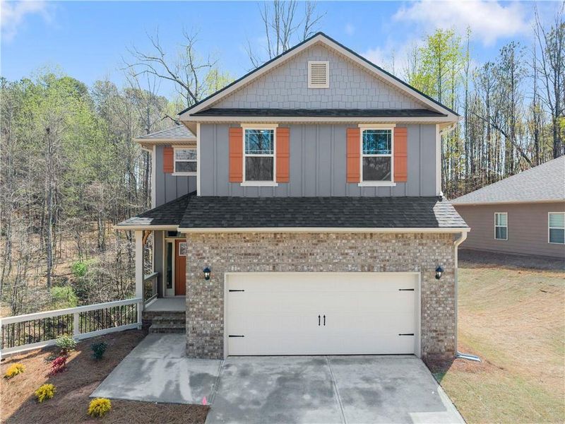 Front exterior of a new home in Magnolia Villas, Cornelia, GA, highlighting curb appeal (Image 24).