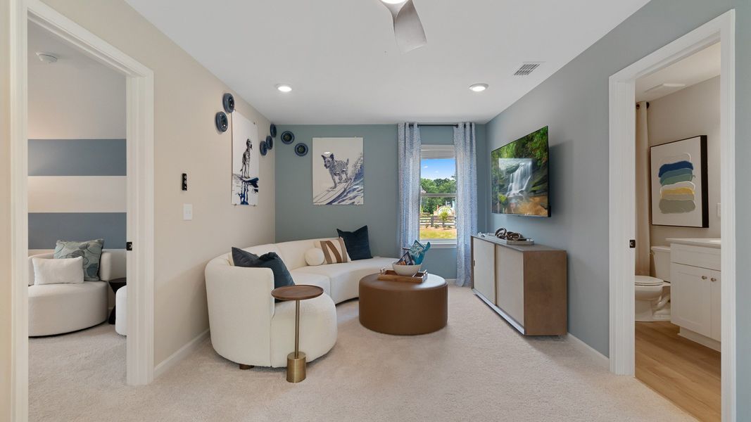 Spacious upstairs loft with plenty of light, perfect for home office or lounge.