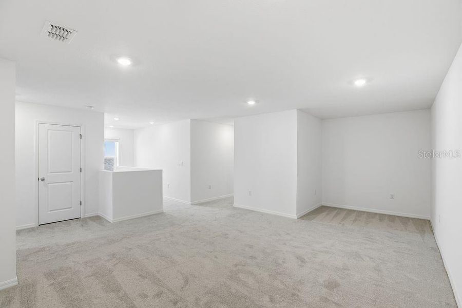 Spacious, unfurnished interior of a new home in Waterstone, Groveland (Image 21).