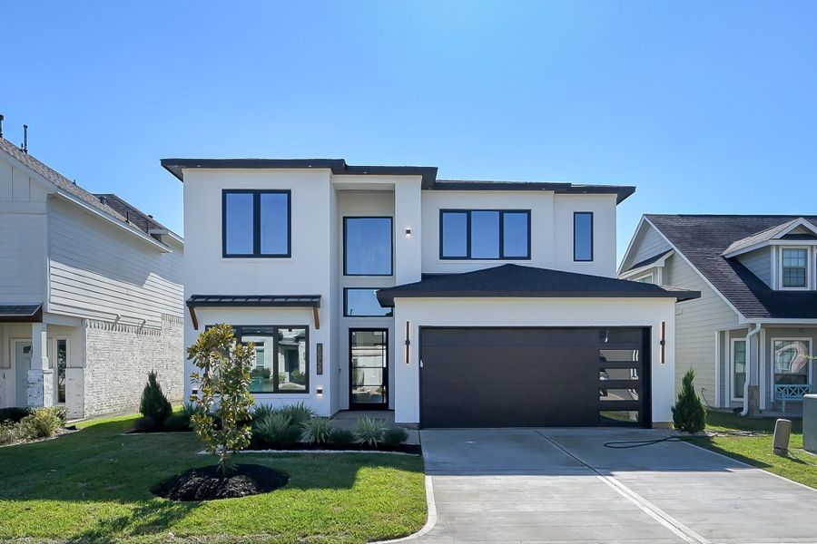 Front exterior of a new home in , Willis, TX, highlighting curb appeal (Image 1). Front exterior of a new home in , Willis, TX, highlighting curb appeal (Image 1).