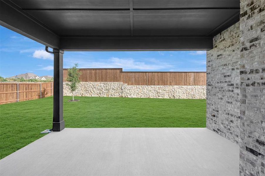 Covered patio with a concrete surface