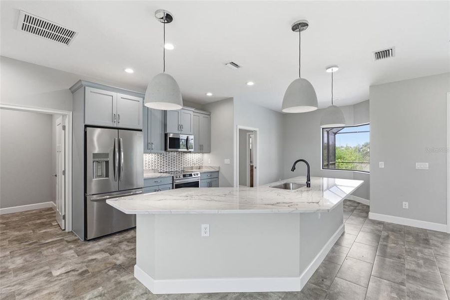 Furnished interior view inside a new home in , Port Charlotte (Image 7).