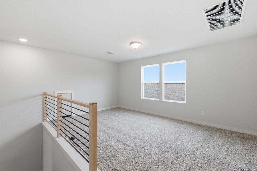 Spacious, unfurnished interior of a new home in The Meadows at Hunters Ranch, San Antonio (Image 26).
