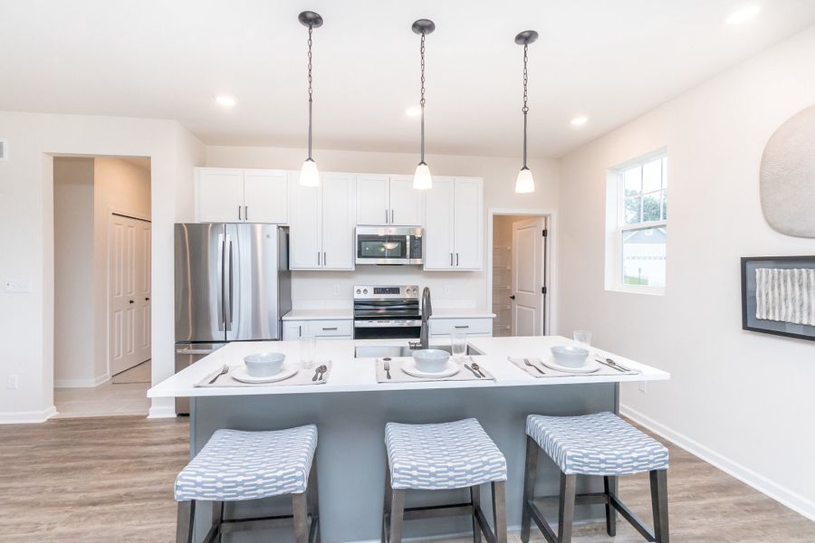 Furnished interior view inside a new home in Mystic Ridge, Whitmore Lake (Image 40).