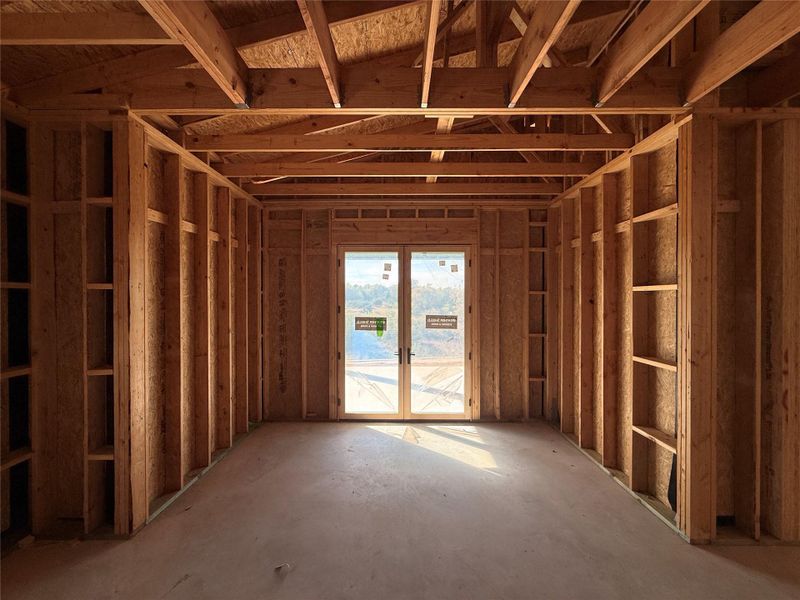 Dining area with patio access through french doors