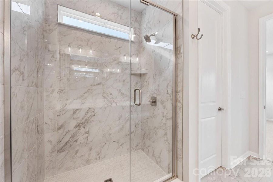 Primary Shower with Tiled Floor and Walls Primary Shower with Tiled Floor and Walls