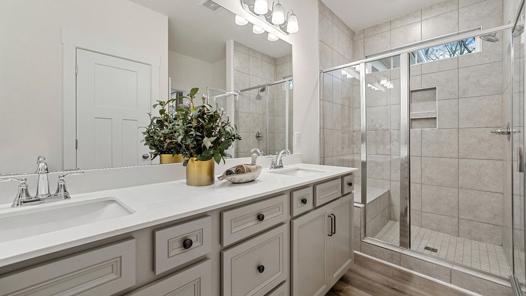 Primary Bathroom of The Oakleigh Design by DRB Homes