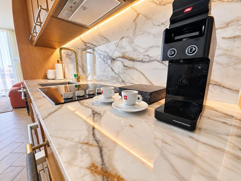 Furnished interior view inside a new home in NoMad Residences, Miami (Image 10).