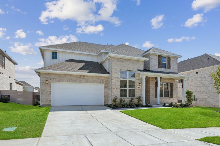 Front exterior of a new home in Painted Tree Lakeside, McKinney, TX, highlighting curb appeal (Image 2). Front exterior of a new home in Painted Tree Lakeside, McKinney, TX, highlighting curb appeal (Image 2).