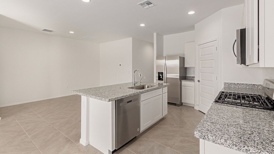 Representative unfurnished interior of a home built from the Easton by D.R. Horton in Casas del Cerrito, Tucson (Image 12).