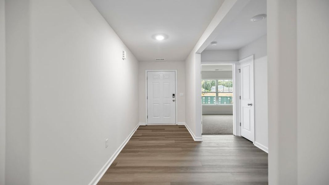 Spacious, unfurnished interior of a new home in Bentley Park, Greenwood (Image 12).