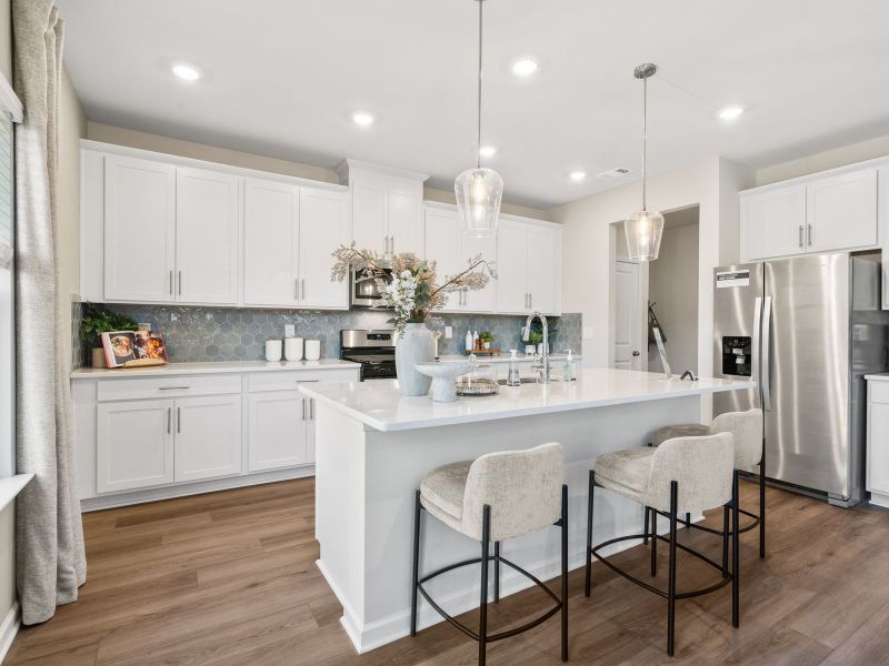 The well-appointed kitchen is perfect for hosting gatherings.
