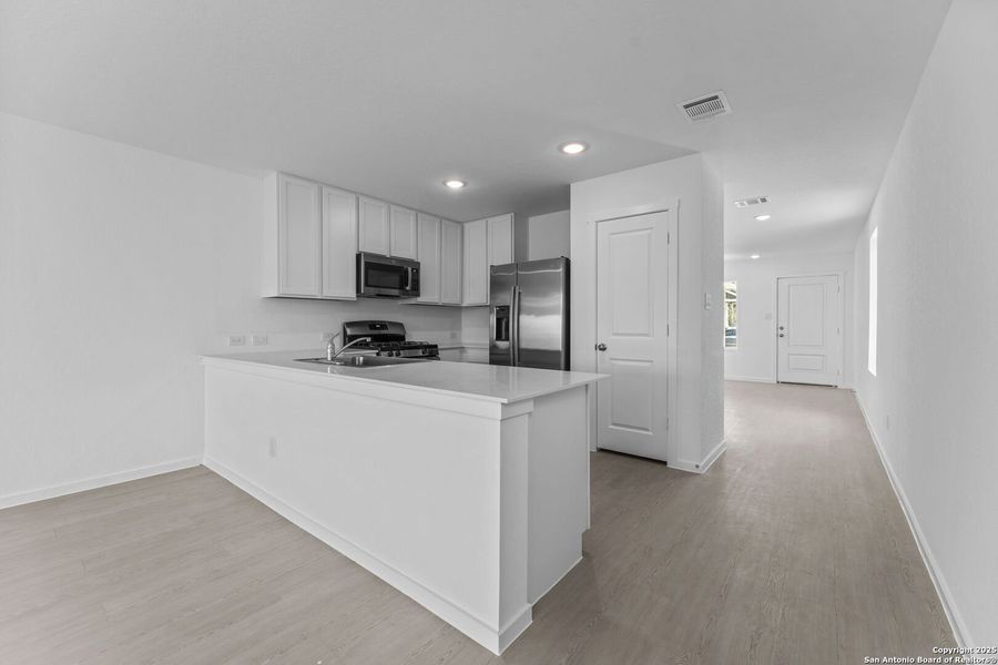 Furnished interior view inside a new home in Waterwheel: Cottage Collection, San Antonio (Image 3). Furnished interior view inside a new home in Waterwheel: Cottage Collection, San Antonio (Image 3).