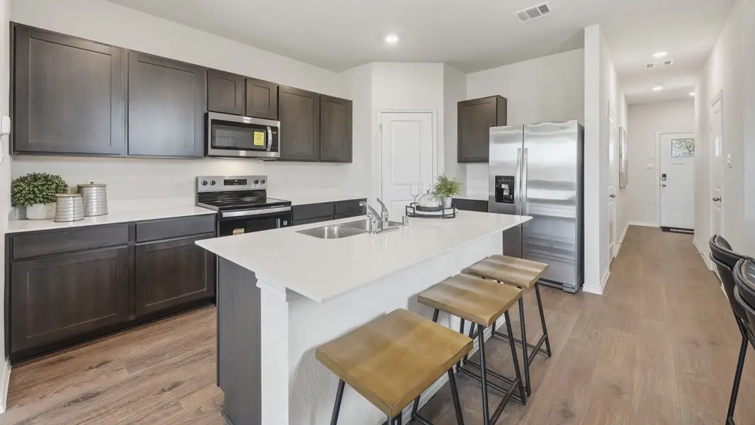 Furnished interior view inside a new home in Arbor Trails South, Princeton (Image 3). Furnished interior view inside a new home in Arbor Trails South, Princeton (Image 3).
