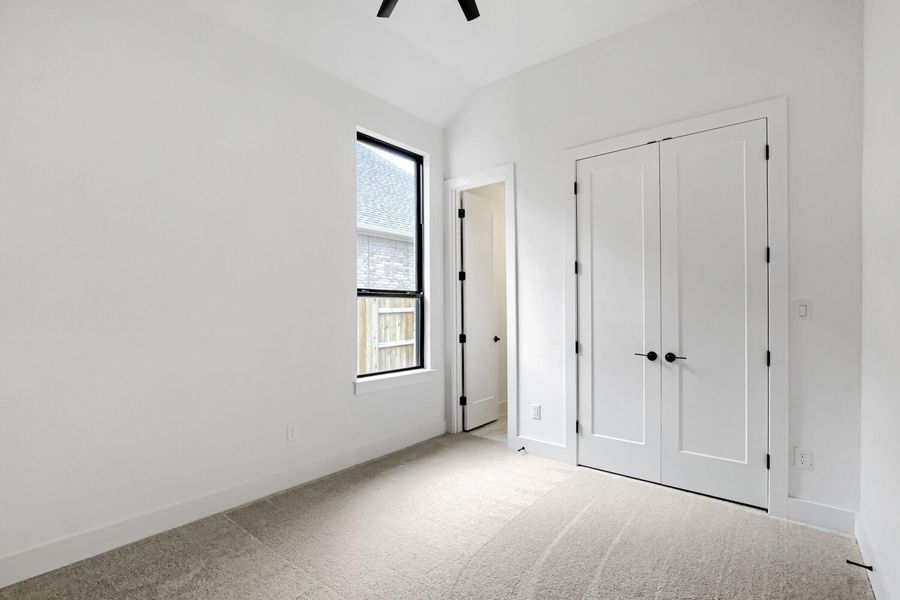 Spacious, unfurnished interior of a new home in 6 Creeks at Waterridge, Kyle (Image 25).
