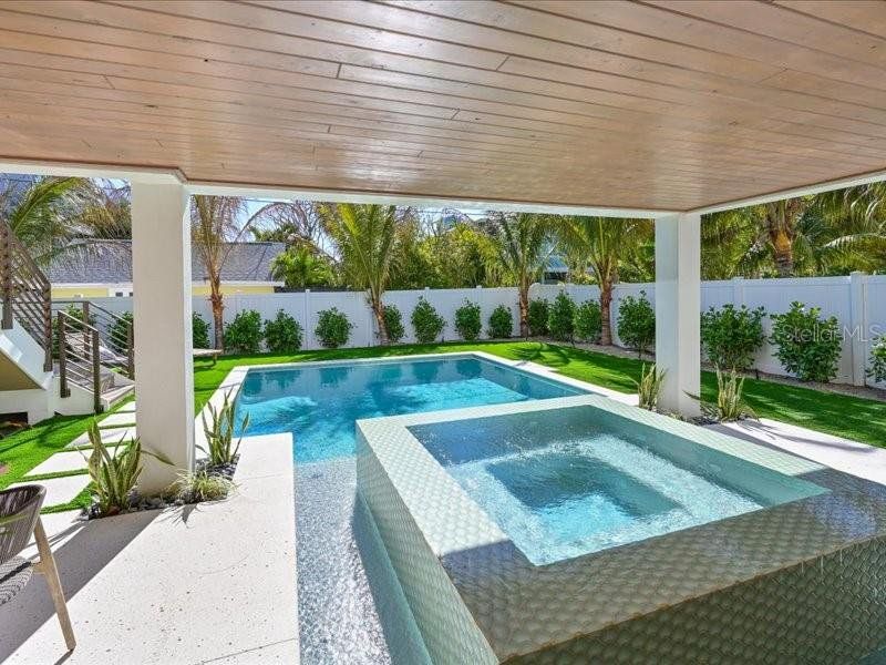 Exterior details and patio area of a home in , Anna Maria (Image 29).