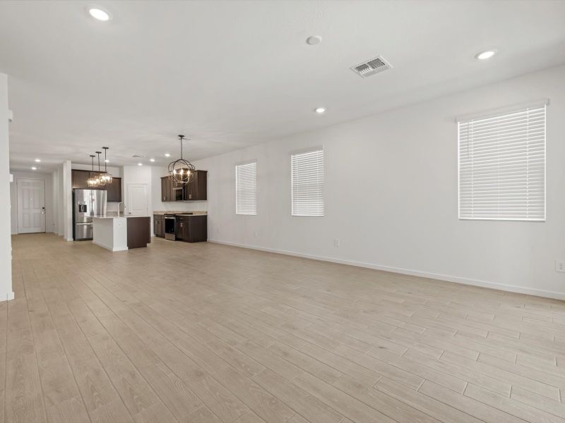 Spacious, unfurnished interior of a new home in Rancho Mirage Estate Series, Maricopa (Image 7).