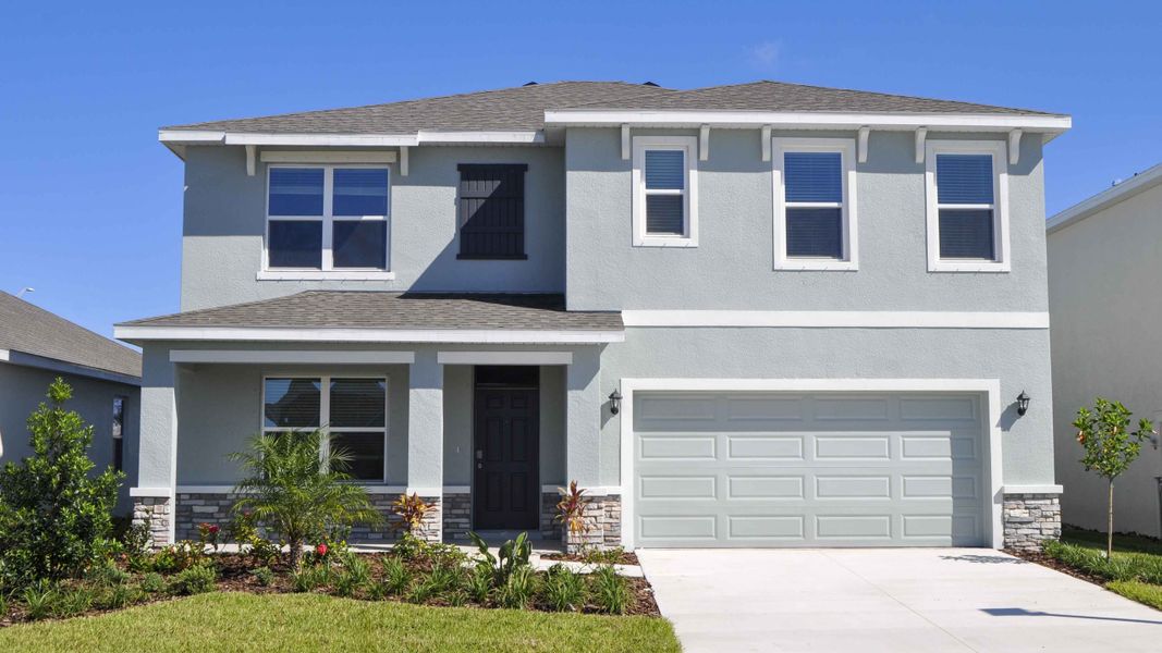 Representative exterior photo of a completed home built from the Hayden by D.R. Horton in Seaire, Parrish, FL (Image 19).