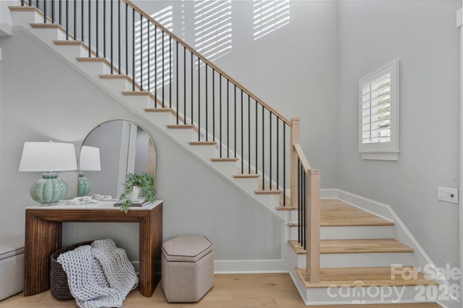upstairs there is a : LOFT, 2nd laundry room, and 3 bedrooms with full en-suite bathrooms and walk-in closets