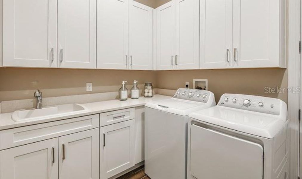 Furnished interior view inside a new home in Center Lake Ranch Community Group Page, St. Cloud (Image 7).