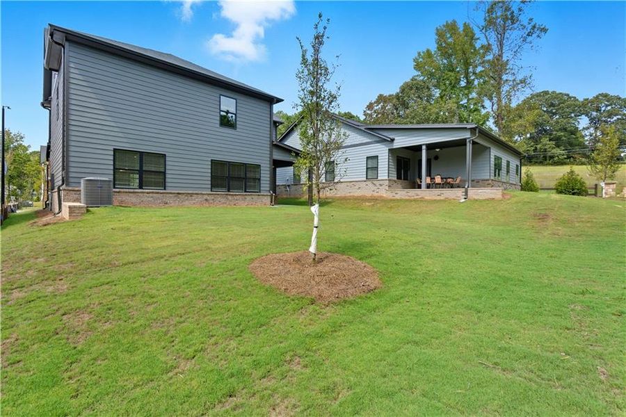 Exterior details and patio area of a home in Meadow Pines, Dallas (Image 10).