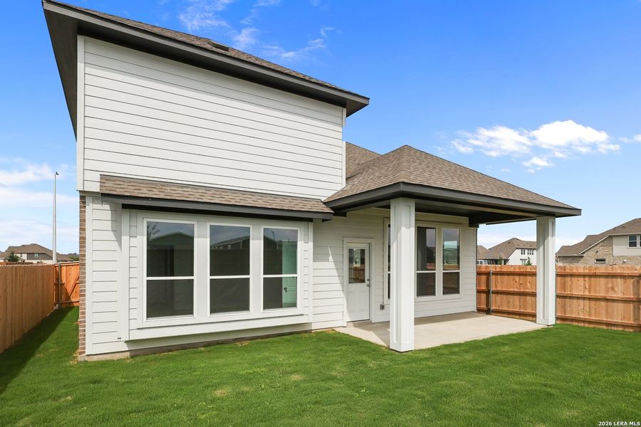 Exterior details and patio area of a home in Sunflower Ridge, New Braunfels (Image 4).