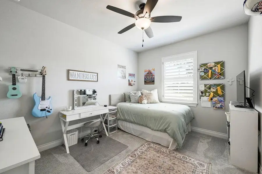 Bedroom with light carpet, ceiling fan Bedroom with light carpet, ceiling fan