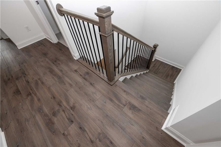 stairs leading up to the second floor - Pictures represent a previously built home, not the actual home.