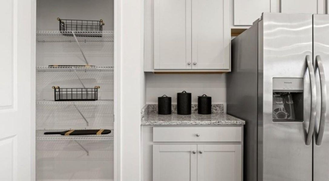 Furnished interior view inside a new home in Towns at Ivy Creek, Buford (Image 12).