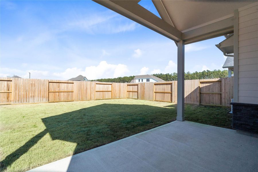 This beautifully defined backyard creates a clean, pristine canvas, ready for you to design and cultivate your ideal green space.