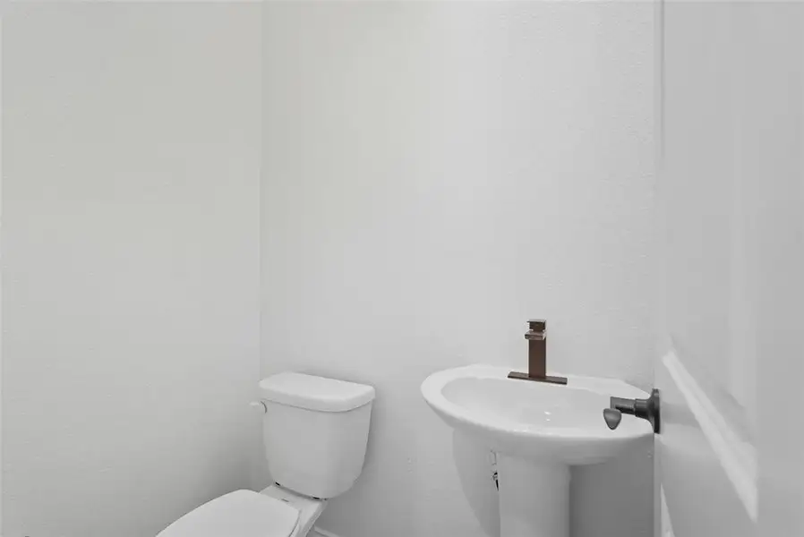 Bathroom featuring toilet Bathroom featuring toilet