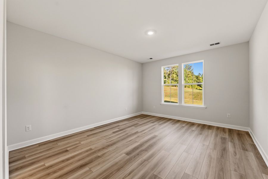 Spacious, unfurnished interior of a new home in Cottages at Lake Emory, Inman (Image 19). Spacious, unfurnished interior of a new home in Cottages at Lake Emory, Inman (Image 19).