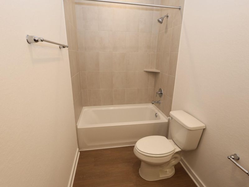 Furnished interior view inside a new home in Pinewood at Grand Texas, New Caney (Image 9).